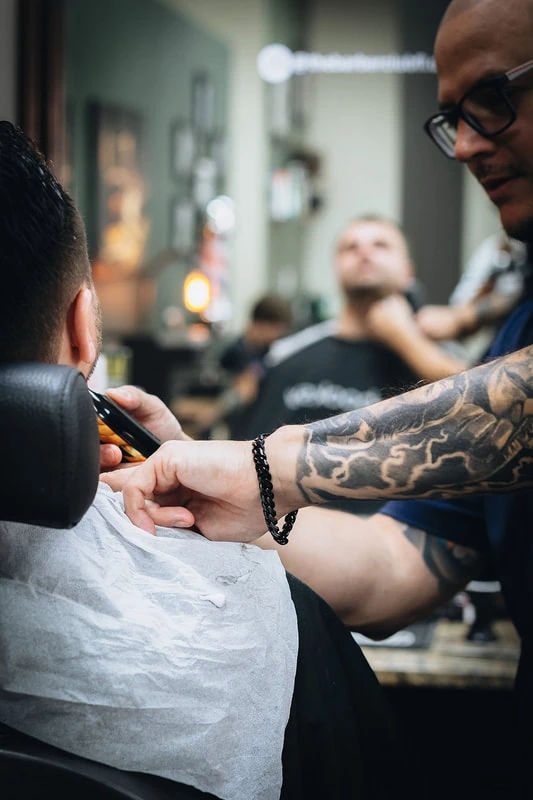 Barber at work — The Barber Club Pompano Beach