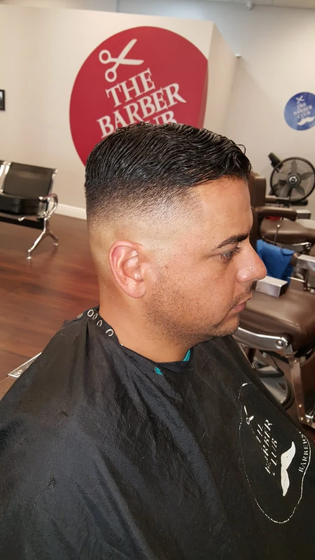 Expert haircut at The Barber Club Pompano Beach